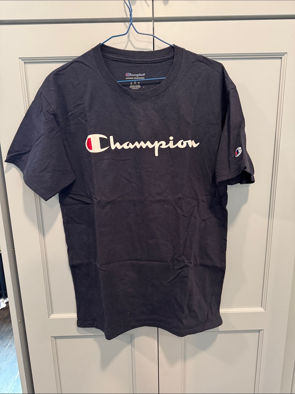 Champion Navy Tee with White Script and Red Accent